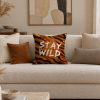 Statement Art Kussen – Stay Wild – Sfeerfoto interieur Statement Art Kussen – Stay Wild – Sfeerfoto interieur - Printcandy